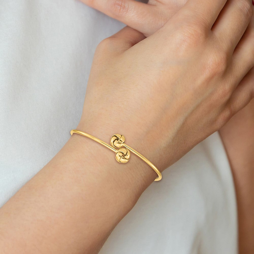 14K Polished 9.5mm Love Knot 2.00mm Flexible Oval Bangle Bracelet
