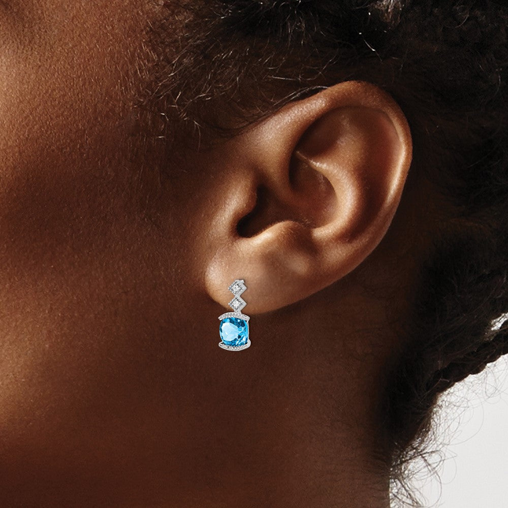 14k White Gold 6mm Cushion Blue Topaz and .04 carat Diamond Post Earrings