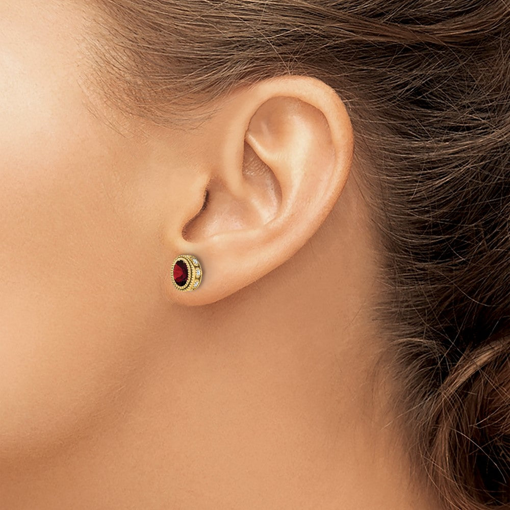 14k 6x4mm Oval Garnet and .19 carat Diamond Post Earrings