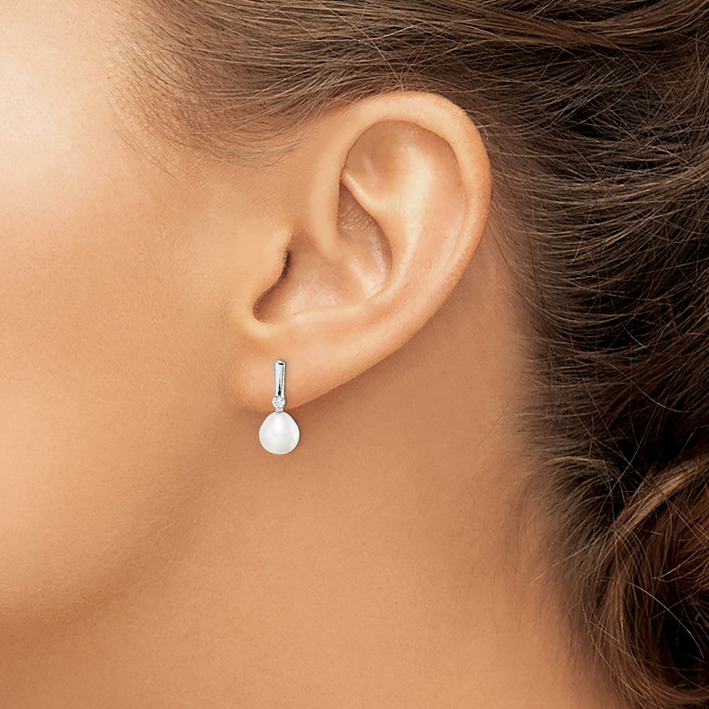 Sterling Silver Rhodium-plated 7-8mm White Rice Freshwater Cultured Pearl and CZ Post Dangle Earrings