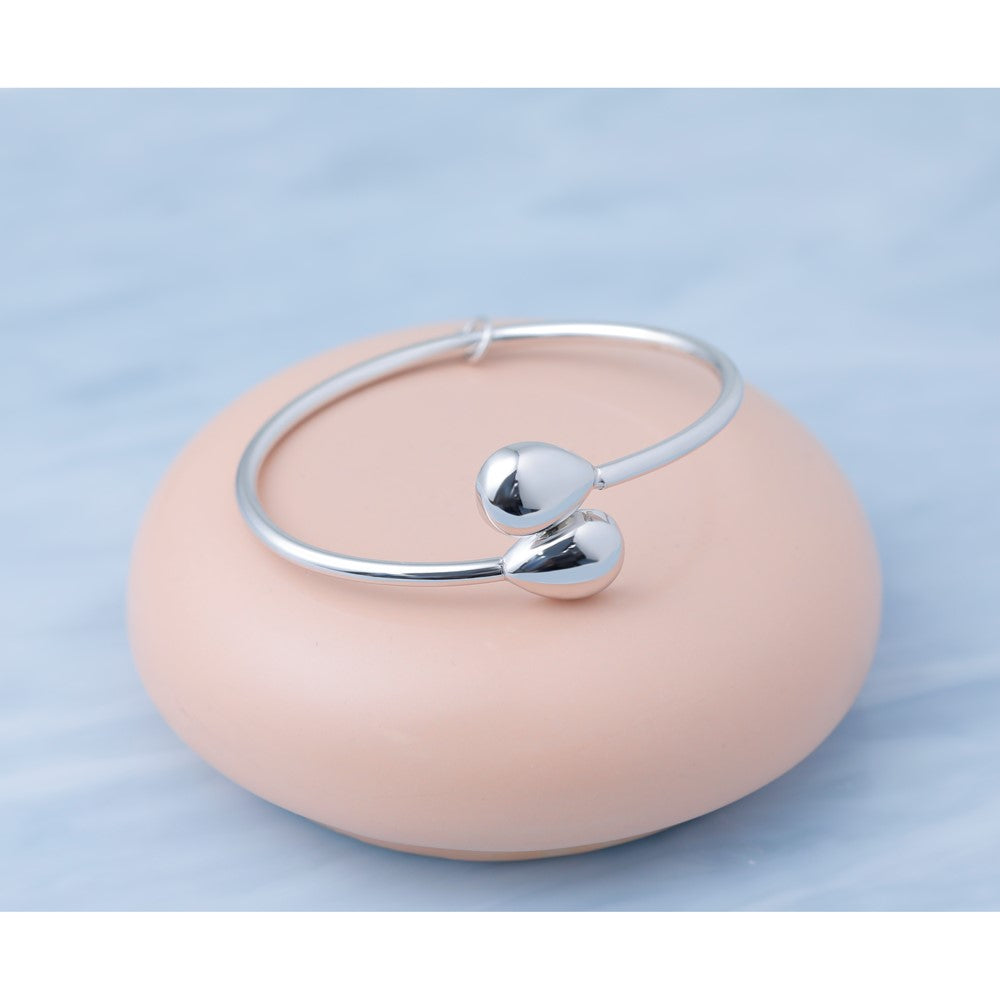 Sterling Silver RH-plated Teardrop accent Flexible Bypass Bangle