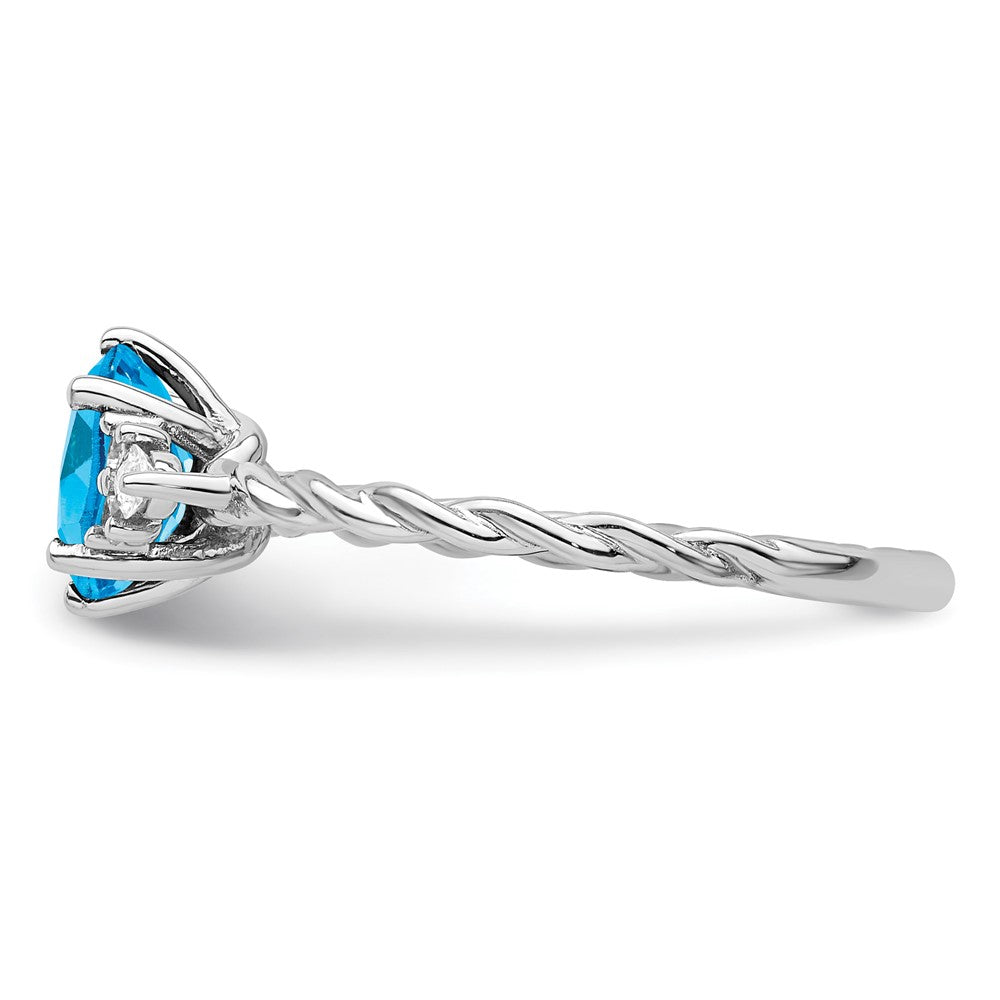 14K White Gold Diamond and 7x5 Oval December/Blue Topaz Size 7 Twisted Ring