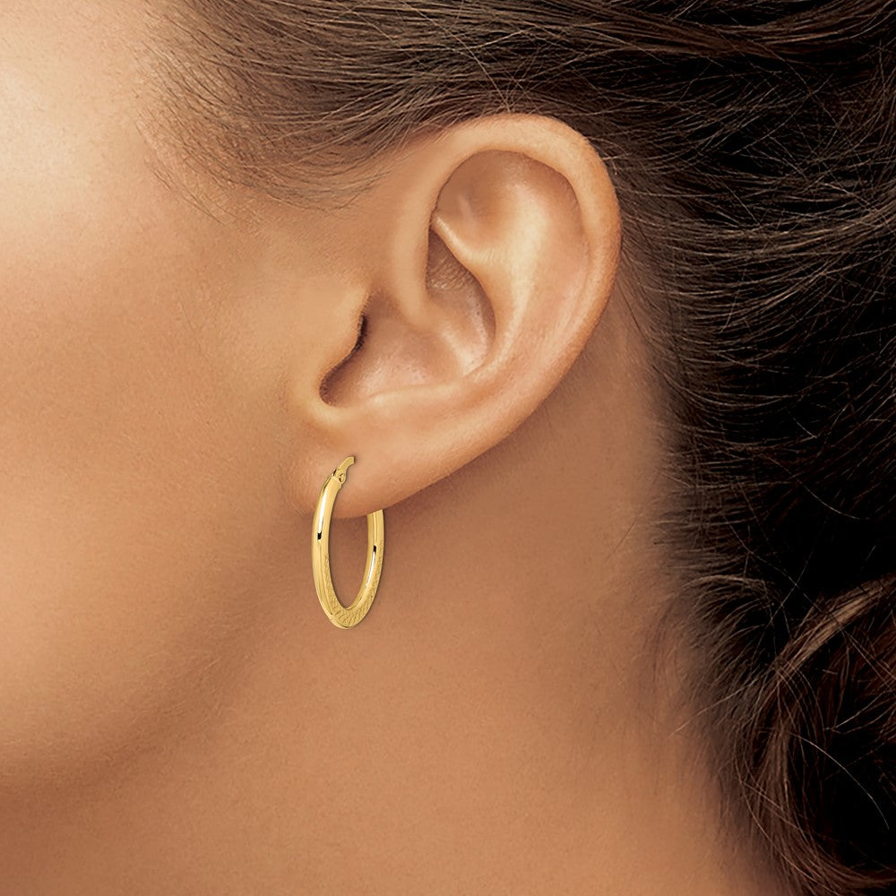 14K 2x25mm Diamond-cut Oval Hoop Earrings