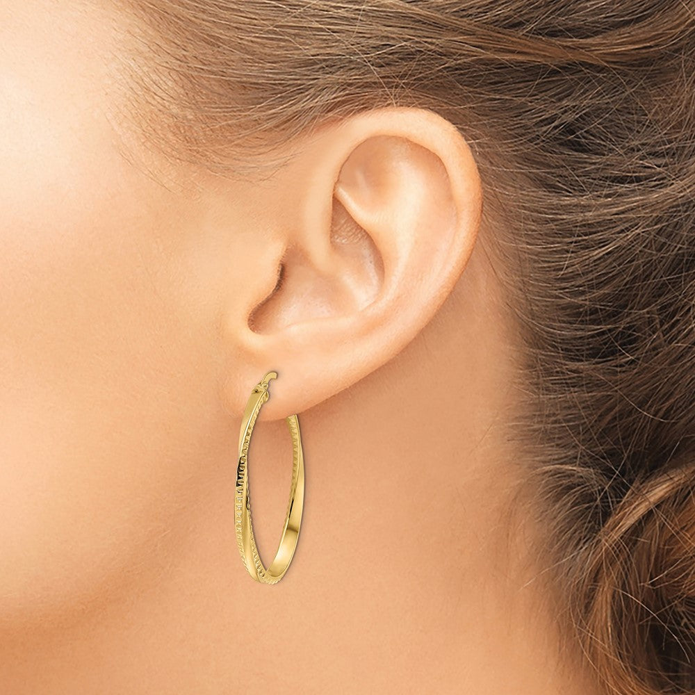 14K Polished Twisted Oval Hoop Earrings