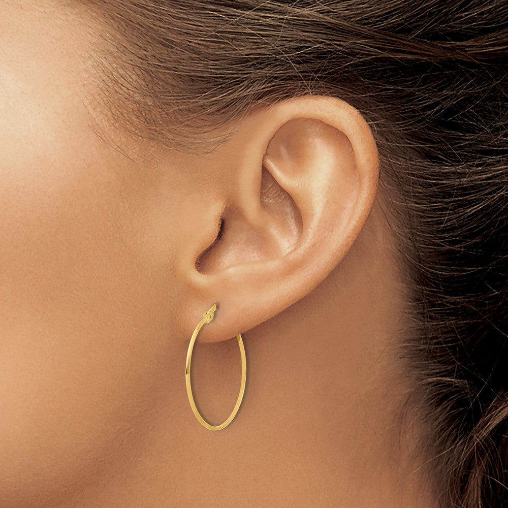 14K 1.1x26mm Polished Knife-Edge Tube Hoop Earrings