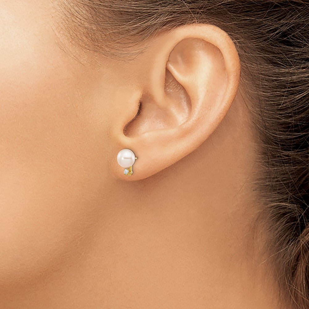 14k 6-7mm White Round Freshwater Cultured Pearl and .06 Carat Diamond Post Earrings